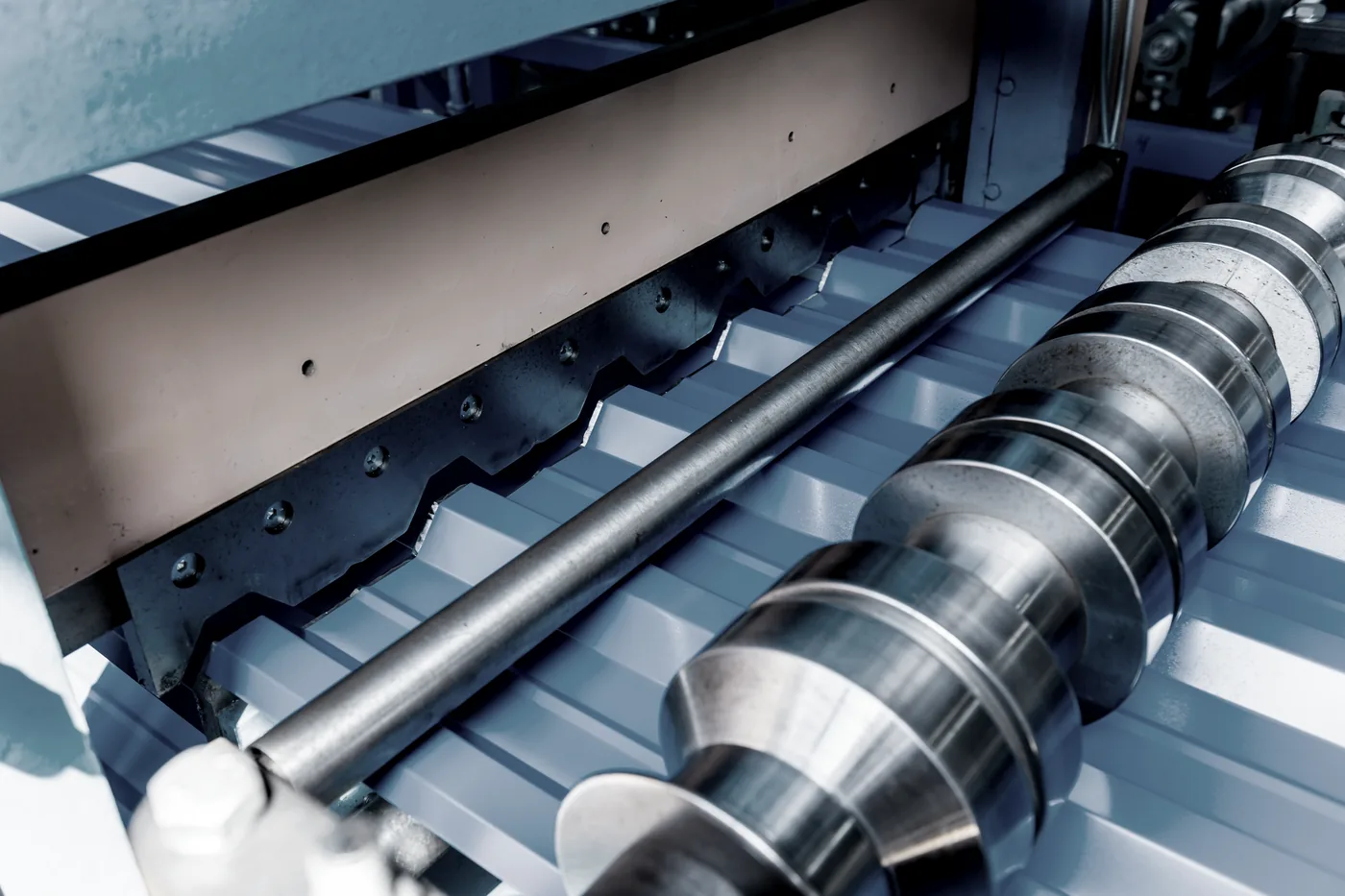 Roll-forming dies of the CZ purlin line — closeup of the rollers that form C and Z purlins in Houston