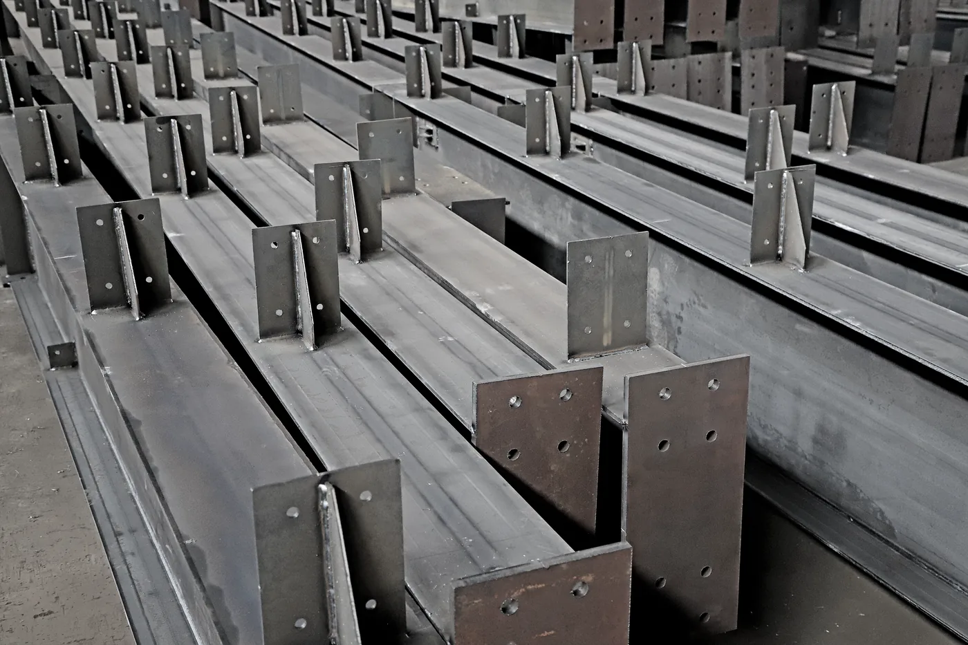 Welded and primed steel I-beams — the product class of the I-beam welding line being commissioned