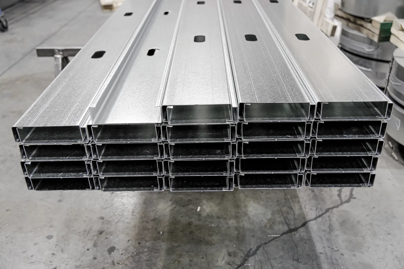 Stacked galvanized light-gauge C-profile studs off the KS-1622 framing line