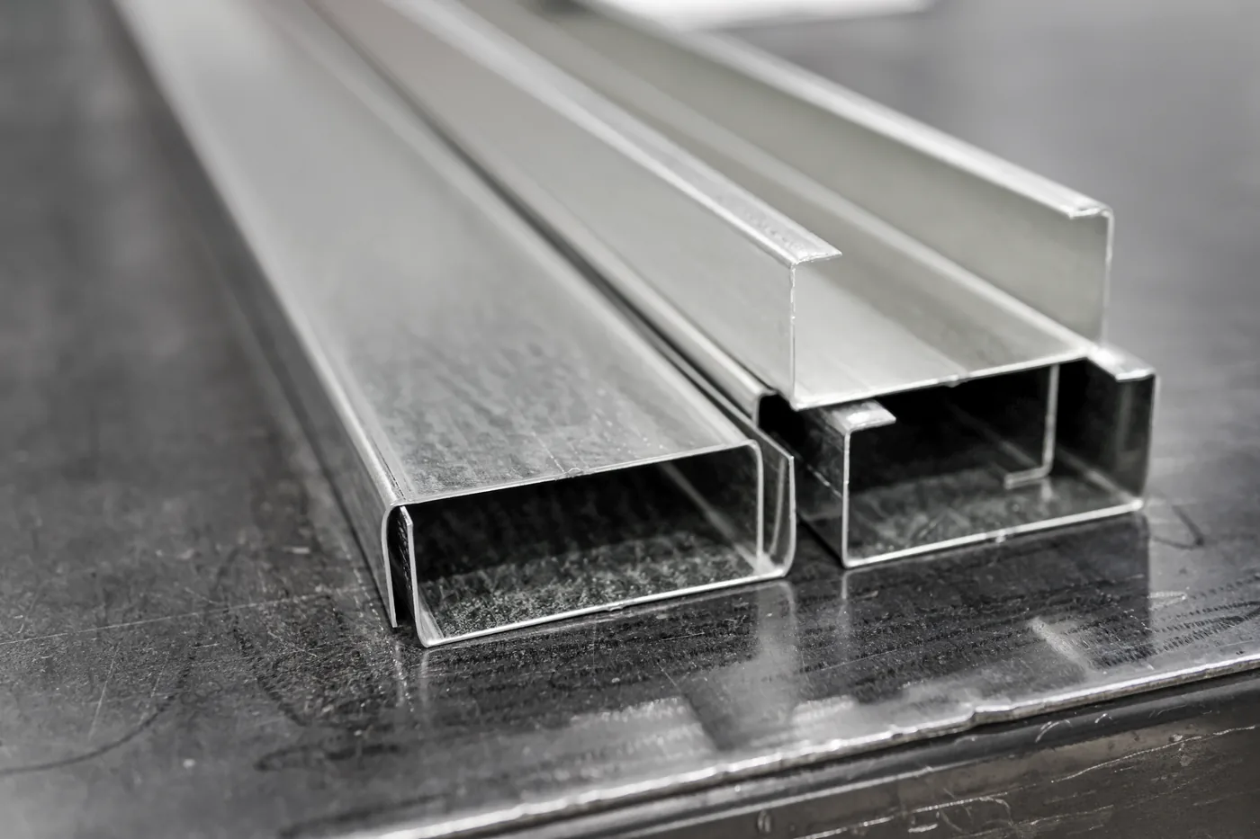 Galvanized light-gauge steel C-profile closeup — studs for barndominium and interior framing